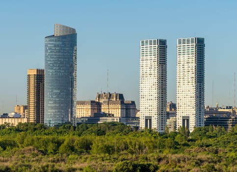 Large modern apartment buildings of Puerto Madero by the shoreline in Buenos Aires Argentina