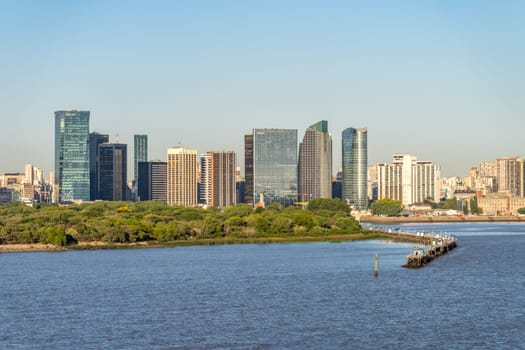 Buenos Aires, Argentina - 6 February 2023: Wide panorama of the city skyline at the entrance to the port