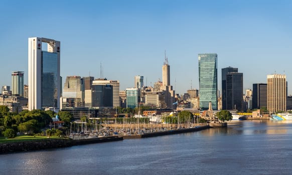 Buenos Aires, Argentina - 6 February 2023: Financial district skyline with marina by the entrance to the port