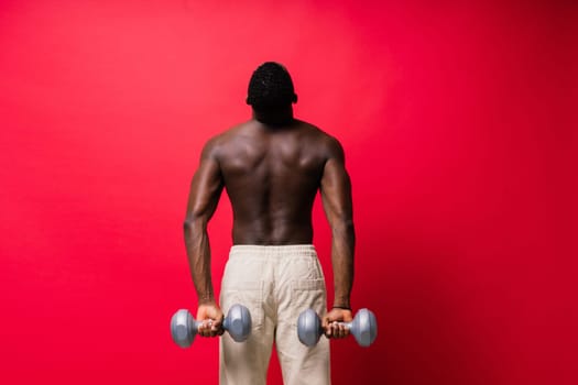 Muscular black african man with muscles abs abdominal, exercise determination and success