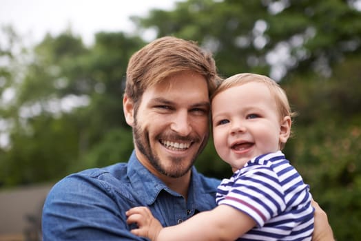 Dads pride and joy. young father and his baby boy enjoying a day outside