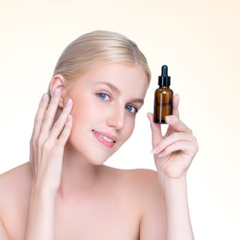 Closeup personable portrait of beautiful woman applying essential oil bottle for skincare product. Cannabis extracted CBD oil dropper for treatment and cannabinoids concept in isolated background.