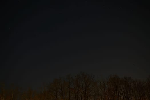 Conjunction of Venus with Jupiter. Night sky - universe with stars.