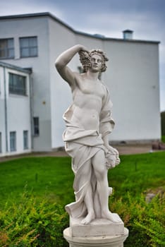 Statue of greek god bacchus in Alleya Statuy of Ermitazh-Vyborg, Vyborg, Russia.