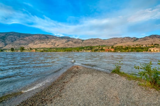 Haynes point on Osoyoos lake with landscape overview on warm summer evening. Sunset landscape on blue sky background