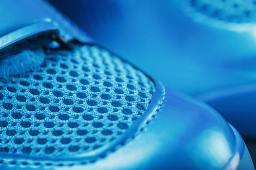 Blue Shiny Bicycle Shoes for Road Bike on Blue Background