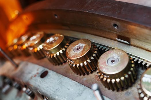 The engine of a gas turbine compressor hangs on a crane during installation in a module for generating electricity