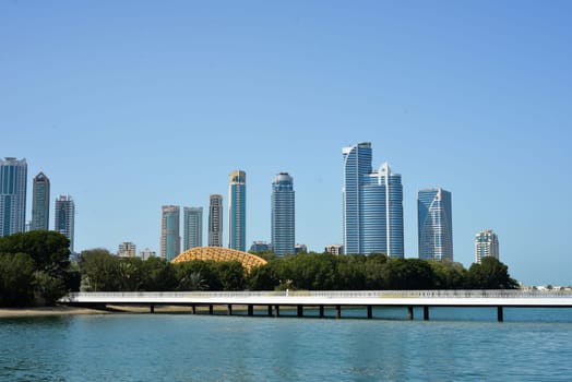 Beautiful waterfront cityscape with skyscrapers of the emirate of Sharjah in the United Arab Emirates.