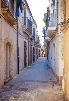 Typical Small street on the Island of Ortigia, Syracuse in Sicily, Italy	