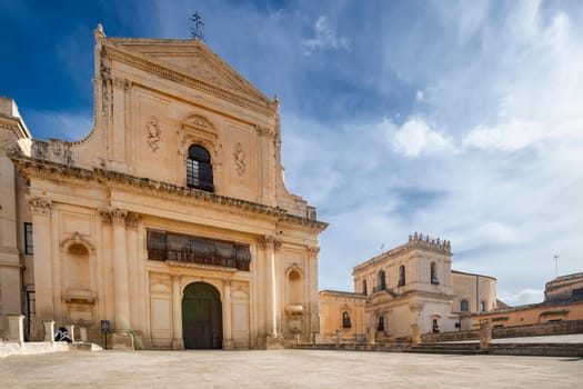 Scenic view in Noto, with San Salvatore Church and Santa Chiara Church—Province of Siracusa, Sicily, Italy.