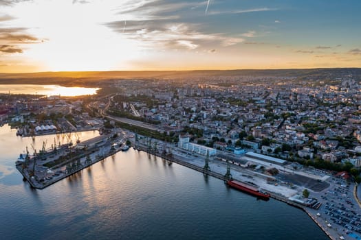 Beauty aerial view of the sea port and industrial zone at sunset in Varna, Bulgaria