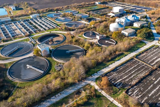 Aerial top view of a city sewage treatment plant.
