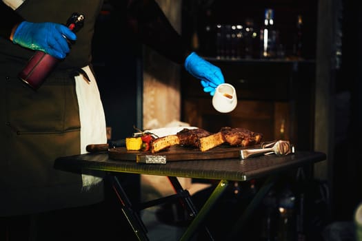 the flesh of an animal especially a mammal as food. Ready tasty rib meat grilled on a cutting board before serving.