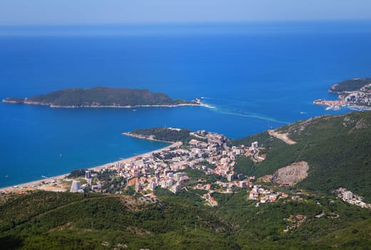 View of the city from the top of the mountain road. View of the coast and the city of Budva Riviera. Montenegro, Balkans, Adriatic Sea, Europe