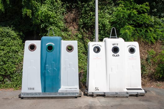 different containers for garbage and glass outdoors, waste sorting and recycling, High quality photo