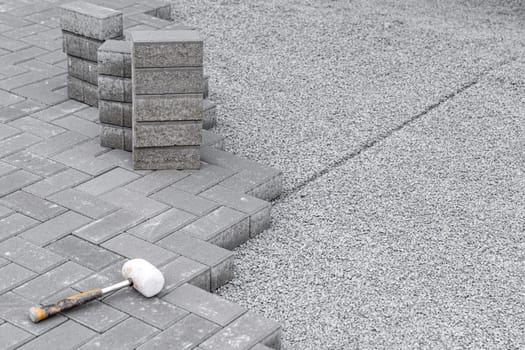 new sidewalk made of concrete interlocking paving blocks.
