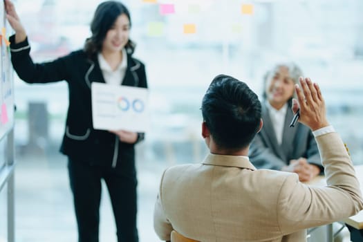 Asian entrepreneurs and business people meeting in a conference room in business planning, financial budget and investment risk assessment to analyze customer groups to increase company growth.