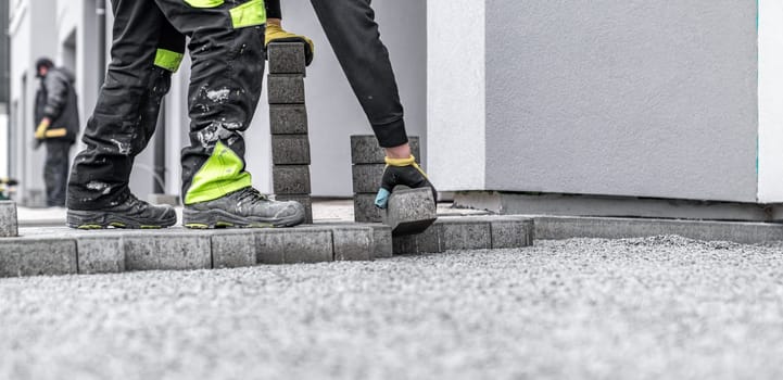 new sidewalk made of concrete interlocking paving blocks.