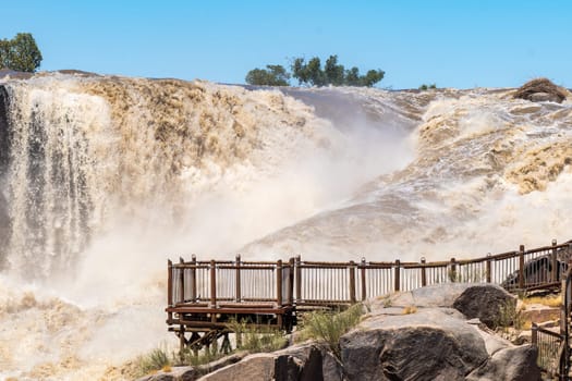 A viewpoint at the main Augrabies waterfall in the flooded Orange River