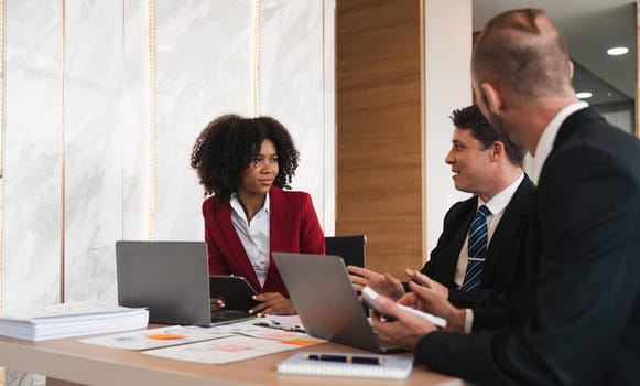 Business team Diverse colleagues gather brainstorm discuss financial statistics at office meeting. finance, teamwork ,data Graphs Charts concept.