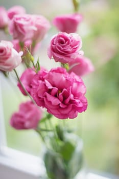 beautiful bouquet of bright pink flowers in a vase eustoma