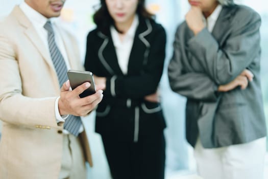 Asian entrepreneurs and business people meeting in a conference room in business planning, financial budget and investment risk assessment to analyze customer groups to increase company growth.