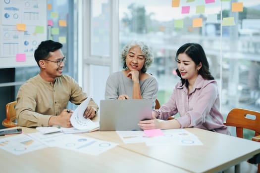 Asian entrepreneurs and business people meeting in a conference room in business planning, financial budget and investment risk assessment to analyze customer groups to increase company growth.