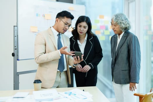 Asian entrepreneurs and business people meeting in a conference room in business planning, financial budget and investment risk assessment to analyze customer groups to increase company growth.