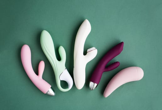 A set of toys for adults on a green background