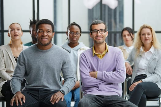 young business people listening to a lecture in the conference hall.