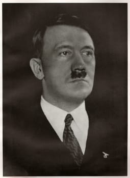GERMANY - 1933: Studio portrait of Adolf Hitler, leader of nazi Germany. Reproduction of antique photo.