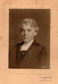 PRAGUE, THE CZECHOSLOVAK REPUBLIC - CIRCA 1930s: Vintage cabinet card shows older woman.