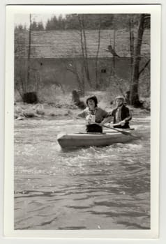 THE CZECHOSLOVAK SOCIALIST REPUBLIC - CIRCA 1980s: Vintage photo shows young canoeists on the river.