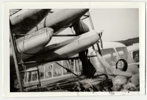 THE CZECHOSLOVAK SOCIALIST REPUBLIC - CIRCA 1980s: Vintage photo shows young canoeist prepares to canoeing.