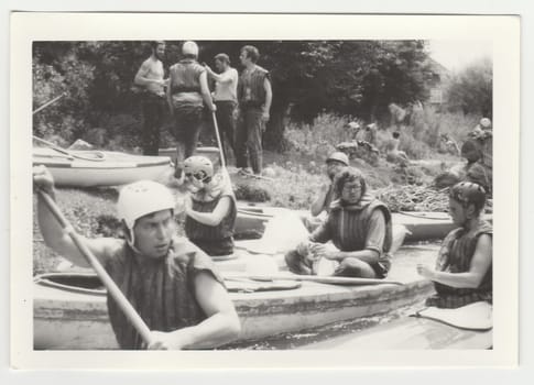 THE CZECHOSLOVAK SOCIALIST REPUBLIC - CIRCA 1980s: Vintage photo shows young canoeists on the river.