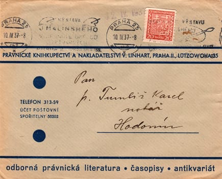 THE CZECHOSLOVAK REPUBLIC - APRIL 10, 1937: A vintage used envelope and stamp. Rich stain and paper details. Can be used as background.