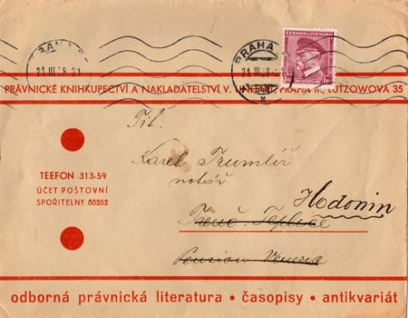 THE CZECHOSLOVAK REPUBLIC - MARCH 21, 1938: A vintage used envelope and stamp. Rich stain and paper details. Can be used as background.