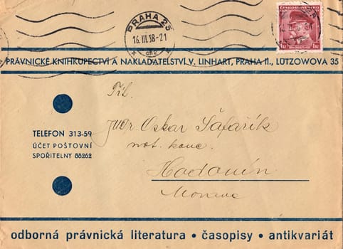THE CZECHOSLOVAK REPUBLIC - APRIL 10, 1937: A vintage used envelope and stamp. Rich stain and paper details. Can be used as background.