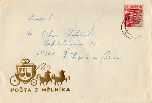 THE CZECHOSLOVAK SOCIALIST REPUBLIC - CIRCA 1970s: A vintage used envelope and stamp. Rich stain and paper details. Can be used as background.