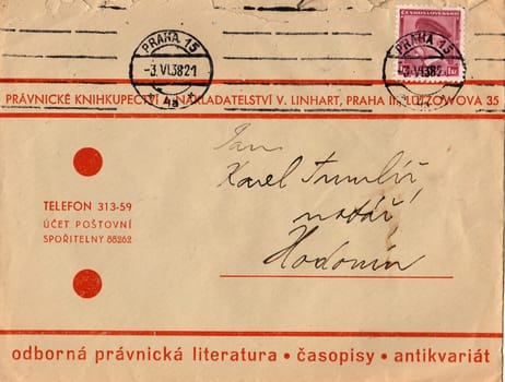 THE CZECHOSLOVAK REPUBLIC - JUNE 3, 1938: A vintage used envelope and stamp. Rich stain and paper details. Can be used as background.