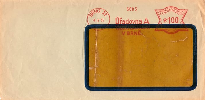 THE CZECHOSLOVAK REPUBLIC - DECEMBER 6, 1935: A vintage used envelope and stamp. Rich stain and paper details. Can be used as background.