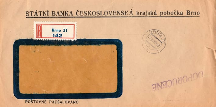 THE CZECHOSLOVAK SOCIALIST REPUBLIC - NOVEMBER 7, 1952: A vintage used envelope. Rich stain and paper details. Can be used as background.