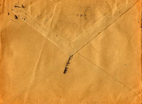 Back of an old used envelope. Rich stain and paper details. Can be used as background.