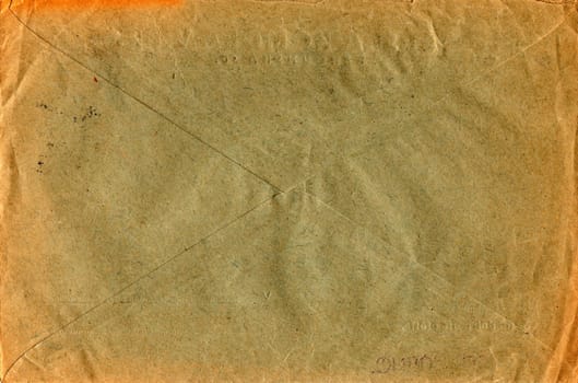 Back of an old used envelope. Rich stain and paper details. Can be used as background.