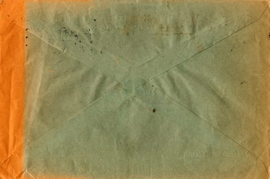 Back of an old used envelope. Rich stain and paper details. Can be used as background.