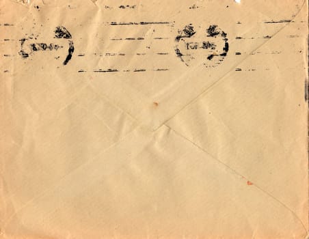 Back of an old used envelope. Rich stain and paper details. Can be used as background.