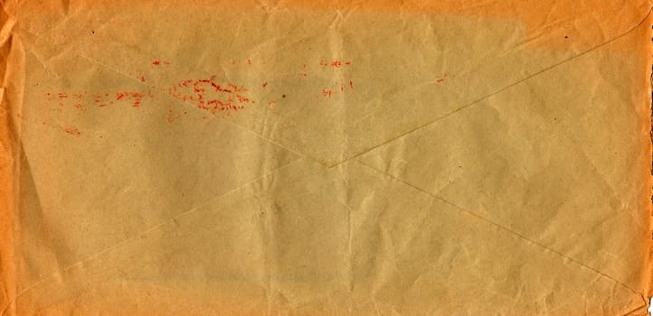 Back of an old used envelope. Rich stain and paper details. Can be used as background.