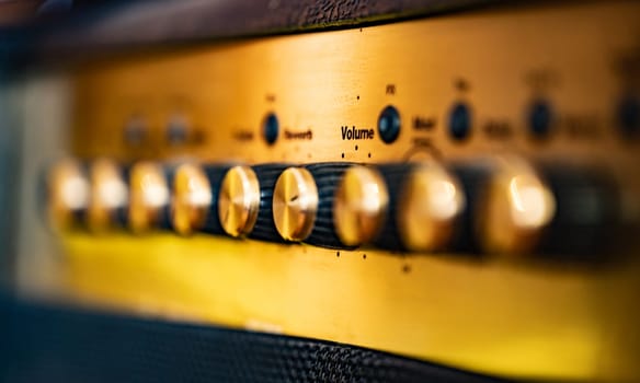 Electric guitar amp level controls, close up