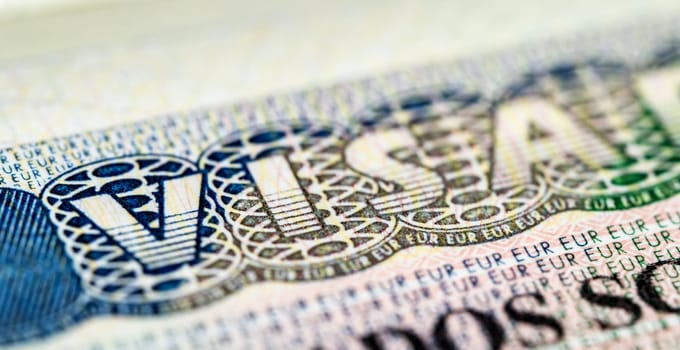 Internationa visa in passport close up view. Schengen visa in passport.