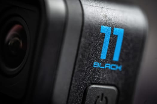Poznan, Poland - 30 November 2022: Logo of Action camera GoPro 11, close up view